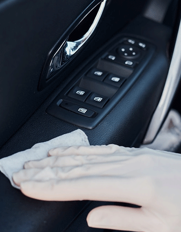 woman-gloves-cleaning-car-interi